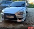 Серый Мицубиси Лансер, объемом двигателя 2 л и пробегом 176 тыс. км за 8500 $, фото 1 на Automoto.ua