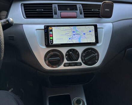 Серый Мицубиси Лансер, объемом двигателя 1.6 л и пробегом 193 тыс. км за 4000 $, фото 20 на Automoto.ua