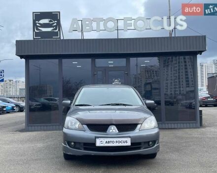 Серый Мицубиси Лансер, объемом двигателя 1.58 л и пробегом 146 тыс. км за 5490 $, фото 2 на Automoto.ua