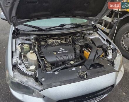 Серый Мицубиси Лансер, объемом двигателя 2 л и пробегом 175 тыс. км за 6500 $, фото 9 на Automoto.ua