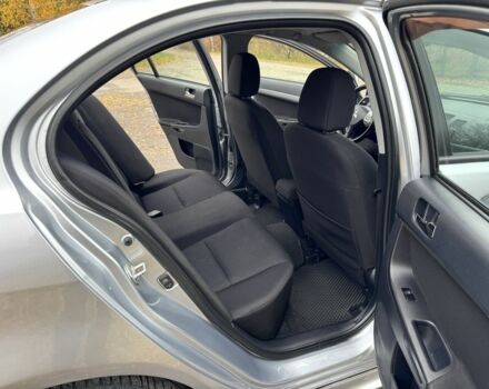 Серый Мицубиси Лансер, объемом двигателя 2 л и пробегом 225 тыс. км за 6890 $, фото 13 на Automoto.ua