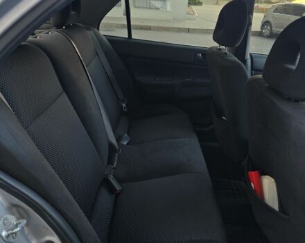 Серый Мицубиси Лансер, объемом двигателя 1.6 л и пробегом 150 тыс. км за 4700 $, фото 5 на Automoto.ua