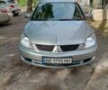 Сірий Міцубісі Lancer, об'ємом двигуна 1.58 л та пробігом 217 тис. км за 4500 $, фото 1 на Automoto.ua