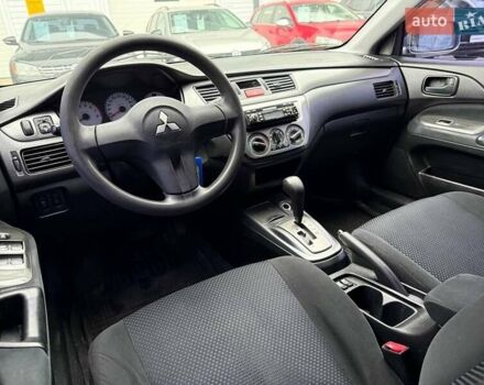 Сірий Міцубісі Lancer, об'ємом двигуна 1.6 л та пробігом 206 тис. км за 4799 $, фото 19 на Automoto.ua