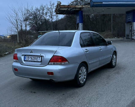 Сірий Міцубісі Lancer, об'ємом двигуна 1.58 л та пробігом 180 тис. км за 3900 $, фото 3 на Automoto.ua