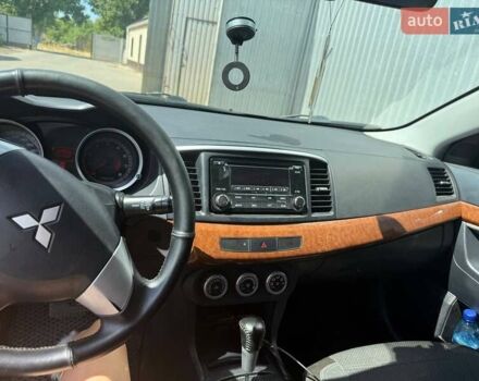 Серый Мицубиси Лансер, объемом двигателя 1.5 л и пробегом 224 тыс. км за 6300 $, фото 2 на Automoto.ua