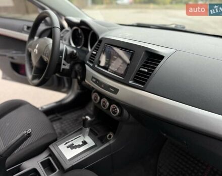 Мицубиси Лансер 2008 в Днепре (Днепропетровске) на Automoto.ua Серый Мицубиси Лансер, объемом двигателя 2 л и пробегом 152 тыс. км за 7999 $, фото 32 на Automoto.ua