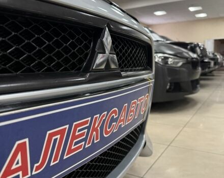 Серый Мицубиси Лансер, объемом двигателя 1.5 л и пробегом 241 тыс. км за 6400 $, фото 5 на Automoto.ua