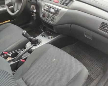 Серый Мицубиси Лансер, объемом двигателя 1.6 л и пробегом 225 тыс. км за 3100 $, фото 6 на Automoto.ua