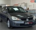 Сірий Міцубісі Lancer, об'ємом двигуна 1.6 л та пробігом 192 тис. км за 5490 $, фото 1 на Automoto.ua