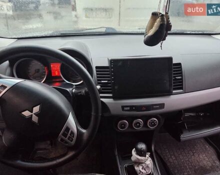 Серый Мицубиси Лансер, объемом двигателя 2 л и пробегом 175 тыс. км за 6500 $, фото 6 на Automoto.ua