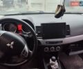 Серый Мицубиси Лансер, объемом двигателя 2 л и пробегом 175 тыс. км за 6500 $, фото 6 на Automoto.ua