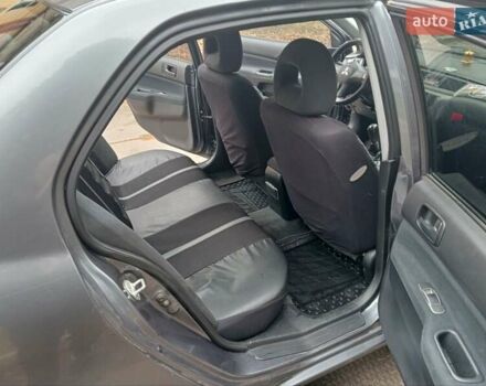 Серый Мицубиси Лансер, объемом двигателя 1.58 л и пробегом 205 тыс. км за 3300 $, фото 10 на Automoto.ua