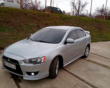 Серый Мицубиси Лансер, объемом двигателя 2 л и пробегом 243 тыс. км за 5500 $, фото 4 на Automoto.ua
