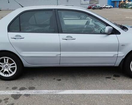 Серый Мицубиси Лансер, объемом двигателя 1.58 л и пробегом 216 тыс. км за 4700 $, фото 9 на Automoto.ua