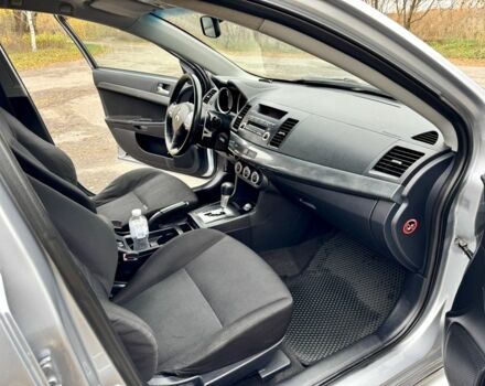 Серый Мицубиси Лансер, объемом двигателя 2 л и пробегом 225 тыс. км за 6890 $, фото 15 на Automoto.ua