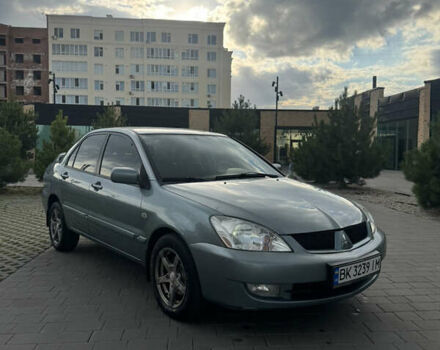 Серый Мицубиси Лансер, объемом двигателя 1.6 л и пробегом 255 тыс. км за 4700 $, фото 12 на Automoto.ua
