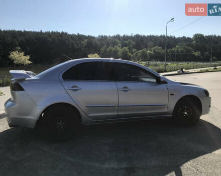 Серый Мицубиси Лансер, объемом двигателя 2 л и пробегом 256 тыс. км за 7000 $, фото 3 на Automoto.ua