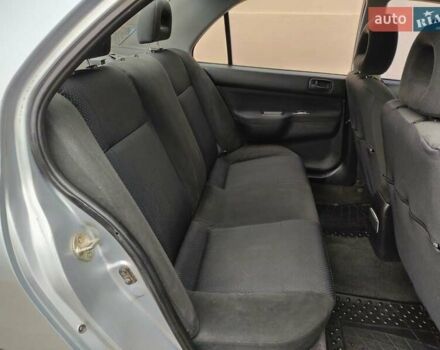 Серый Мицубиси Лансер, объемом двигателя 1.58 л и пробегом 185 тыс. км за 4700 $, фото 13 на Automoto.ua