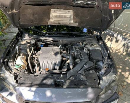 Сірий Міцубісі Lancer, об'ємом двигуна 1.5 л та пробігом 255 тис. км за 8000 $, фото 19 на Automoto.ua