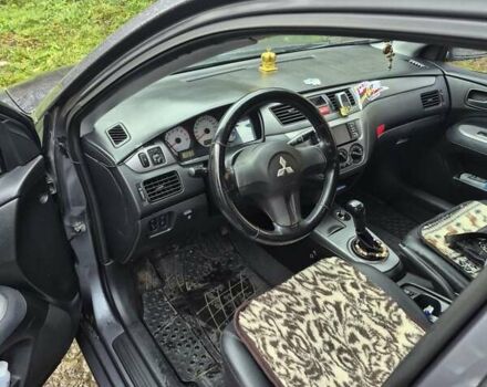 Сірий Міцубісі Lancer, об'ємом двигуна 1.6 л та пробігом 230 тис. км за 4400 $, фото 6 на Automoto.ua