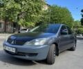 Сірий Міцубісі Lancer, об'ємом двигуна 1.6 л та пробігом 320 тис. км за 3100 $, фото 1 на Automoto.ua