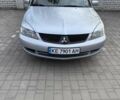 Сірий Міцубісі Lancer, об'ємом двигуна 1.58 л та пробігом 272 тис. км за 5500 $, фото 1 на Automoto.ua
