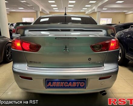 Серый Мицубиси Лансер, объемом двигателя 1.5 л и пробегом 241 тыс. км за 6400 $, фото 2 на Automoto.ua