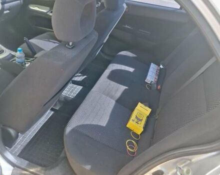 Сірий Міцубісі Lancer, об'ємом двигуна 1.6 л та пробігом 217 тис. км за 6000 $, фото 3 на Automoto.ua