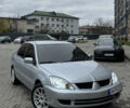 Сірий Міцубісі Lancer, об'ємом двигуна 1.6 л та пробігом 269 тис. км за 3999 $, фото 2 на Automoto.ua