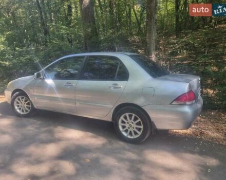Сірий Міцубісі Lancer, об'ємом двигуна 1.6 л та пробігом 290 тис. км за 3850 $, фото 8 на Automoto.ua