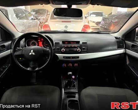 Серый Мицубиси Лансер, объемом двигателя 1.5 л и пробегом 241 тыс. км за 6400 $, фото 11 на Automoto.ua