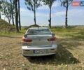 Серый Мицубиси Лансер, объемом двигателя 2 л и пробегом 238 тыс. км за 6000 $, фото 1 на Automoto.ua