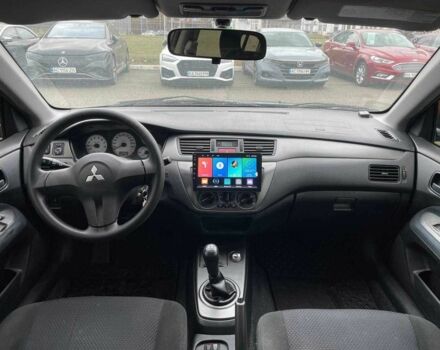 Серый Мицубиси Лансер, объемом двигателя 1.6 л и пробегом 146 тыс. км за 5990 $, фото 11 на Automoto.ua