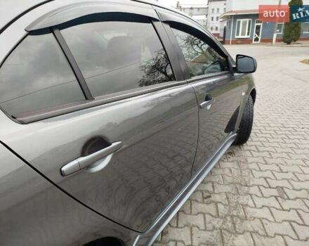Міцубісі Lancer 2008 у Хмельницькому на Automoto.ua Сірий Міцубісі Lancer, об'ємом двигуна 2 л та пробігом 157 тис. км за 6300 $, фото 54 на Automoto.ua