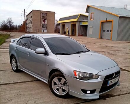Серый Мицубиси Лансер, объемом двигателя 2 л и пробегом 243 тыс. км за 5500 $, фото 3 на Automoto.ua