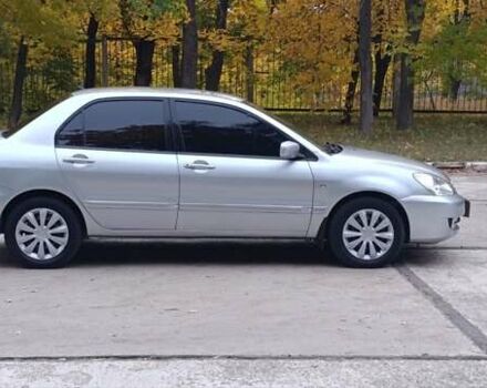 Сірий Міцубісі Lancer, об'ємом двигуна 1.6 л та пробігом 176 тис. км за 4999 $, фото 14 на Automoto.ua