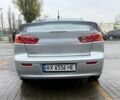 Серый Мицубиси Лансер, объемом двигателя 2 л и пробегом 210 тыс. км за 6500 $, фото 3 на Automoto.ua