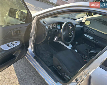 Серый Мицубиси Лансер, объемом двигателя 1.6 л и пробегом 193 тыс. км за 4000 $, фото 8 на Automoto.ua