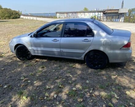 Сірий Міцубісі Lancer, об'ємом двигуна 1.6 л та пробігом 283 тис. км за 2600 $, фото 3 на Automoto.ua