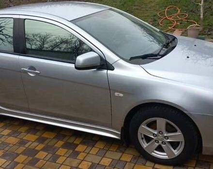 Серый Мицубиси Лансер, объемом двигателя 2 л и пробегом 149 тыс. км за 6800 $, фото 3 на Automoto.ua