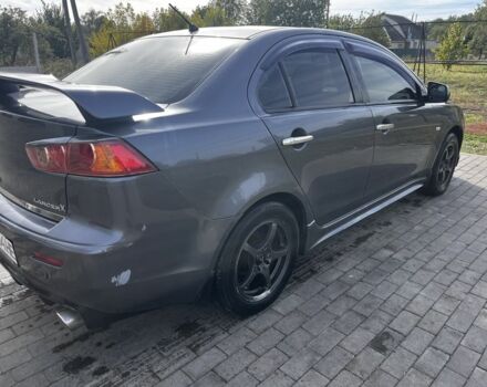 Серый Мицубиси Лансер, объемом двигателя 2 л и пробегом 224 тыс. км за 6500 $, фото 3 на Automoto.ua