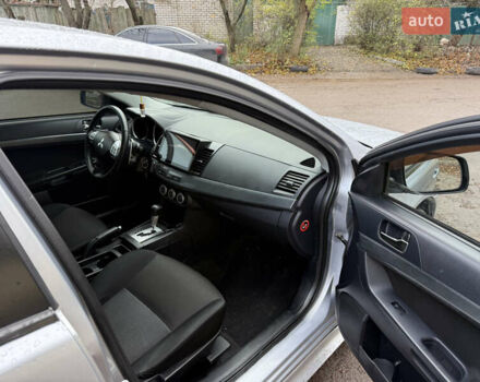 Серый Мицубиси Лансер, объемом двигателя 2 л и пробегом 265 тыс. км за 5200 $, фото 6 на Automoto.ua