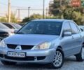 Сірий Міцубісі Lancer, об'ємом двигуна 1.6 л та пробігом 187 тис. км за 4950 $, фото 1 на Automoto.ua