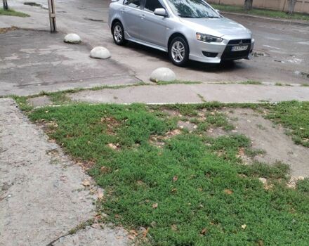 Сірий Міцубісі Lancer, об'ємом двигуна 1.5 л та пробігом 160 тис. км за 5700 $, фото 4 на Automoto.ua