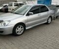 Сірий Міцубісі Lancer, об'ємом двигуна 1.58 л та пробігом 266 тис. км за 4800 $, фото 13 на Automoto.ua