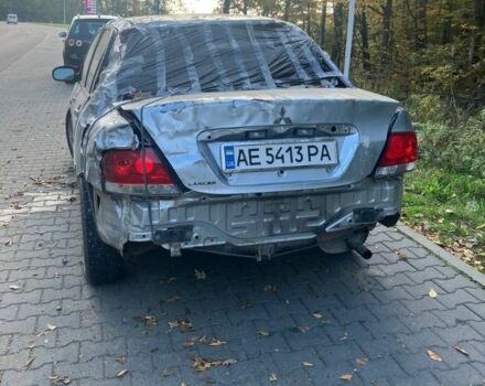 Серый Мицубиси Лансер, объемом двигателя 1.6 л и пробегом 140 тыс. км за 2500 $, фото 2 на Automoto.ua