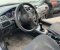 Сірий Міцубісі Lancer, об'ємом двигуна 1.6 л та пробігом 260 тис. км за 4200 $, фото 12 на Automoto.ua