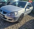 Сірий Міцубісі Lancer, об'ємом двигуна 1.6 л та пробігом 240 тис. км за 2999 $, фото 2 на Automoto.ua