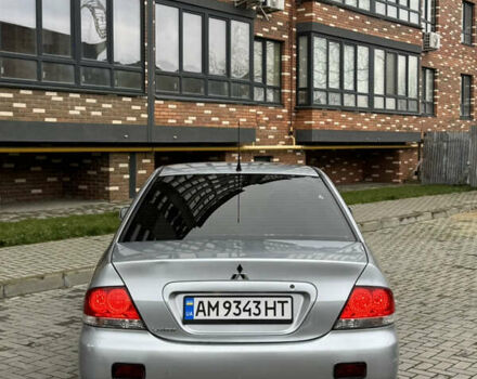 Сірий Міцубісі Lancer, об'ємом двигуна 1.6 л та пробігом 269 тис. км за 3999 $, фото 11 на Automoto.ua